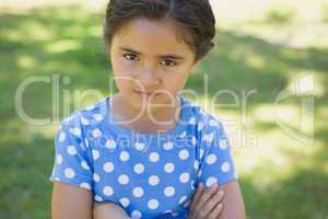 Close-up portrait of a girl at park