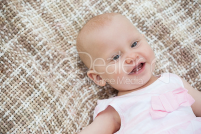 Cute baby lying on blanket