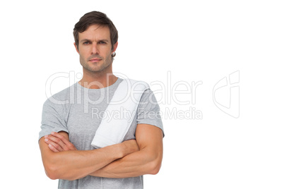 Portrait of a fit young man with towel