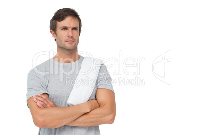 Portrait of a fit young man with towel