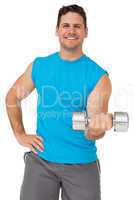 Portrait of a fit man exercising with dumbbell