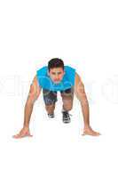 Portrait of a determined young man doing push ups