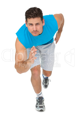 Portrait of a young sporty man running