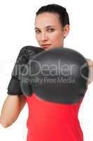 Portrait of a determined female boxer focused on training
