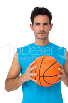 Portrait of a basketball player with ball