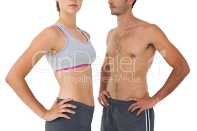 Mid section of a fit young couple