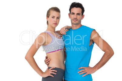 Portrait of a serious sporty young couple