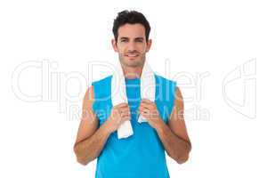 Portrait of a fit young man with towel