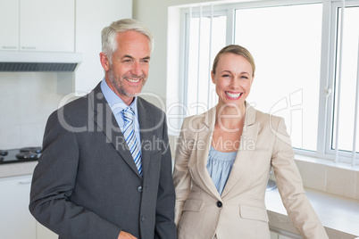 Happy business couple before work in morning