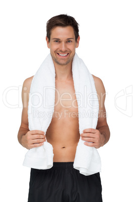 Portrait of a smiling shirtless man with towel