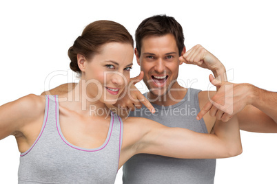 Close-up portrait of a happy fit young couple