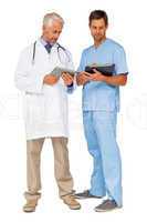 Male doctor and surgeon with digital tablets