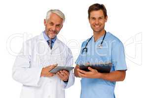 Portrait of male doctor and surgeon with digital tablets