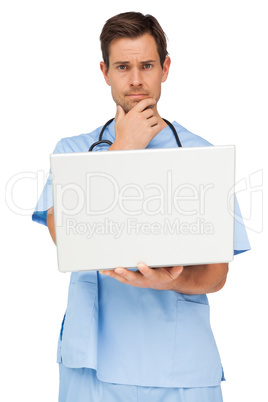 Portrait of a male surgeon using laptop