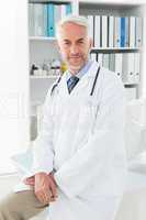 Portrait of a confident male doctor at medical office