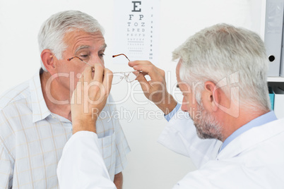 Man wearing glasses after taking vision test at doctor