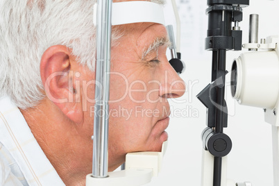 Senior man getting his cornea checked