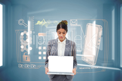 Businesswoman showing laptop with interface