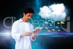 Casual man using tablet with app icons and cloud