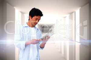 Casual man using tablet with interface