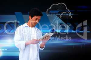 Casual man using tablet with cloud graphic