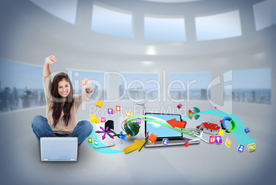 Cheering girl using laptop with app icons