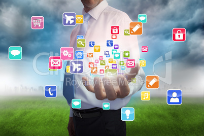 Businessman presenting app icons