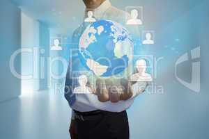 Businessman presenting earth with profile pictures