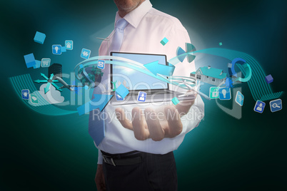 Businessman presenting app icons and laptop