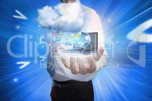 Businessman presenting app icons and laptop with cloud