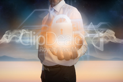 Businessman presenting lock graphic