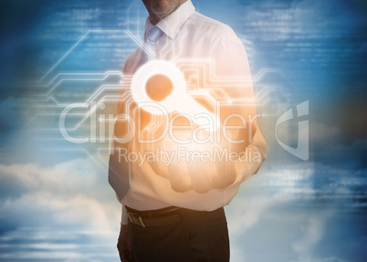 Businessman presenting magnifying glass graphic