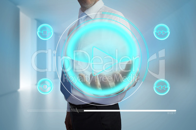 Businessman presenting music player interface