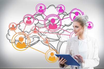 Blonde businesswoman using tablet pc with cloud computing graphi