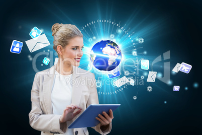 Blonde businesswoman using tablet pc with earth and emails