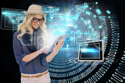 Stylish blonde using tablet pc with interfaces and email icons
