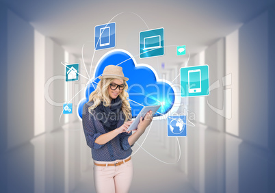 Stylish blonde using tablet pc with app icons and cloud