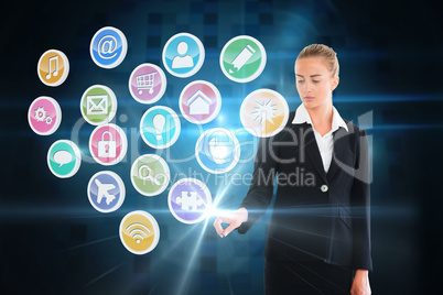 Blonde businesswoman touching app icon interface