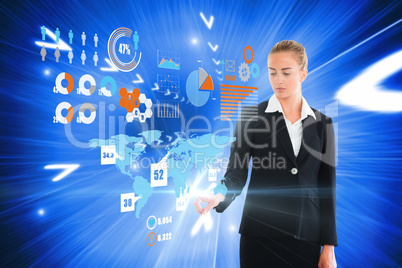 Blonde businesswoman touching interface