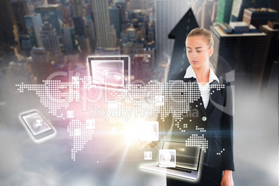 Blonde businesswoman touching map interface Blonde businesswoman touching map interface