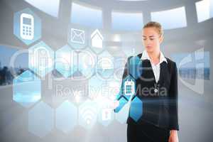 Blonde businesswoman touching app interface