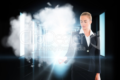 Blonde businesswoman touching light