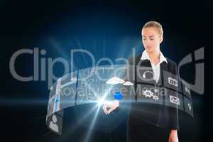 Blonde businesswoman touching app icon menu