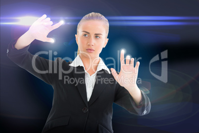 Blonde businesswoman touching lights