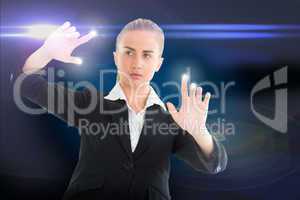 Blonde businesswoman touching lights