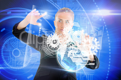 Blonde businesswoman touching interface with earth