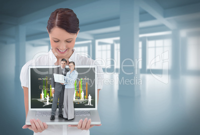 Happy businesswoman showing laptop with business people on it Happy businesswoman showing laptop with business people on it
