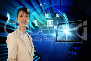 Businesswoman with profile icons and tablet