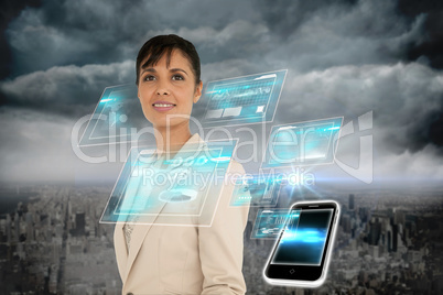 Businesswoman with interface and smartphone