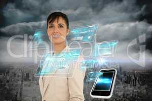 Businesswoman with interface and smartphone